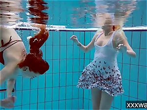 hot Russian gals swimming in the pool